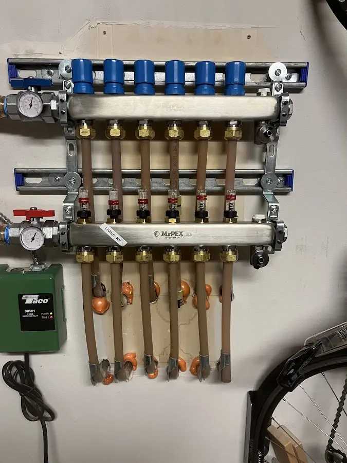 Plumber performing Gas Leak Detection at a residential property in Johnston